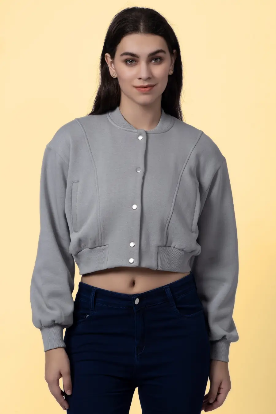 Front view of the 'Raya' bomber jacket sewing pattern, displaying its stylish cropped fit, ribbed details, and structured seams.