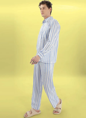 Side profile of a model in the 'Arbor' men's pajama set. A comfortable and stylish loungewear sewing pattern available in multiple sizes.
