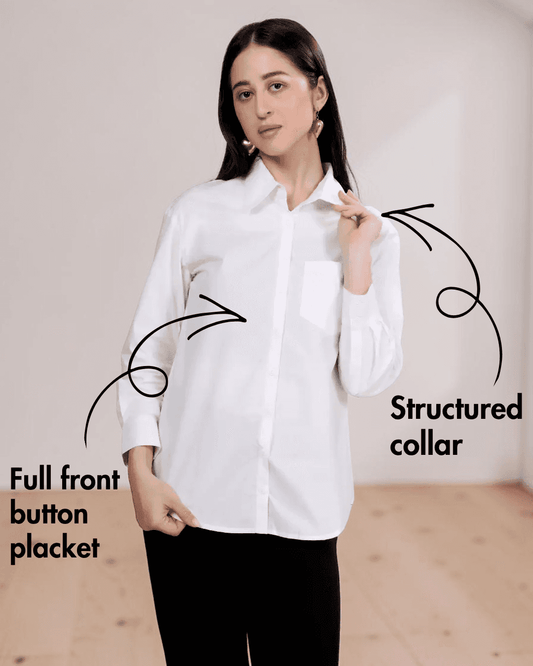 Woman wearing white classic shirt with structured collar, full front button placket, and long sleeves