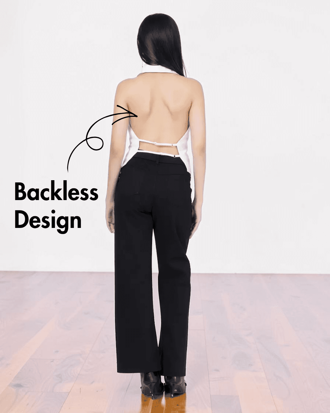 Back view of white halter vest with open back design and structured fit