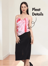 Model wearing pink and white tie-dye sewing pattern top 'Freesia' with pleat details