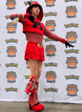 Person dressed in a red and black Pokémon-themed costume at a Pokémon Championships event