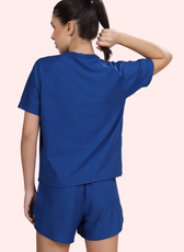 Back view of the 'Maria' activewear coord set, showing the raglan-sleeve T-shirt and elasticated waistband shorts. Designed for ease of movement and breathability.