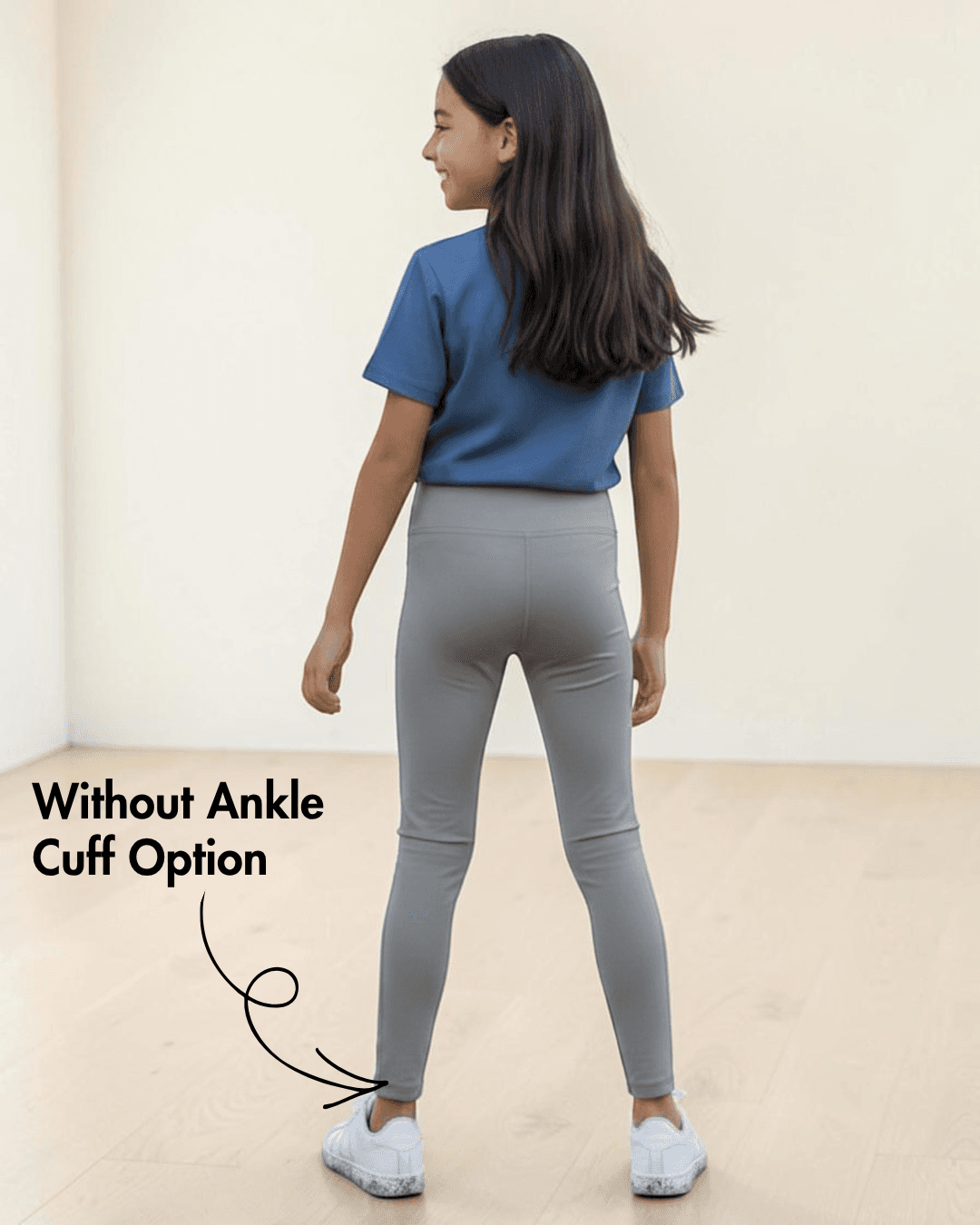 Back view of girl in gray leggings with elastic waistband, showing fit and style of Kid's Leggings Sewing Pattern Avery