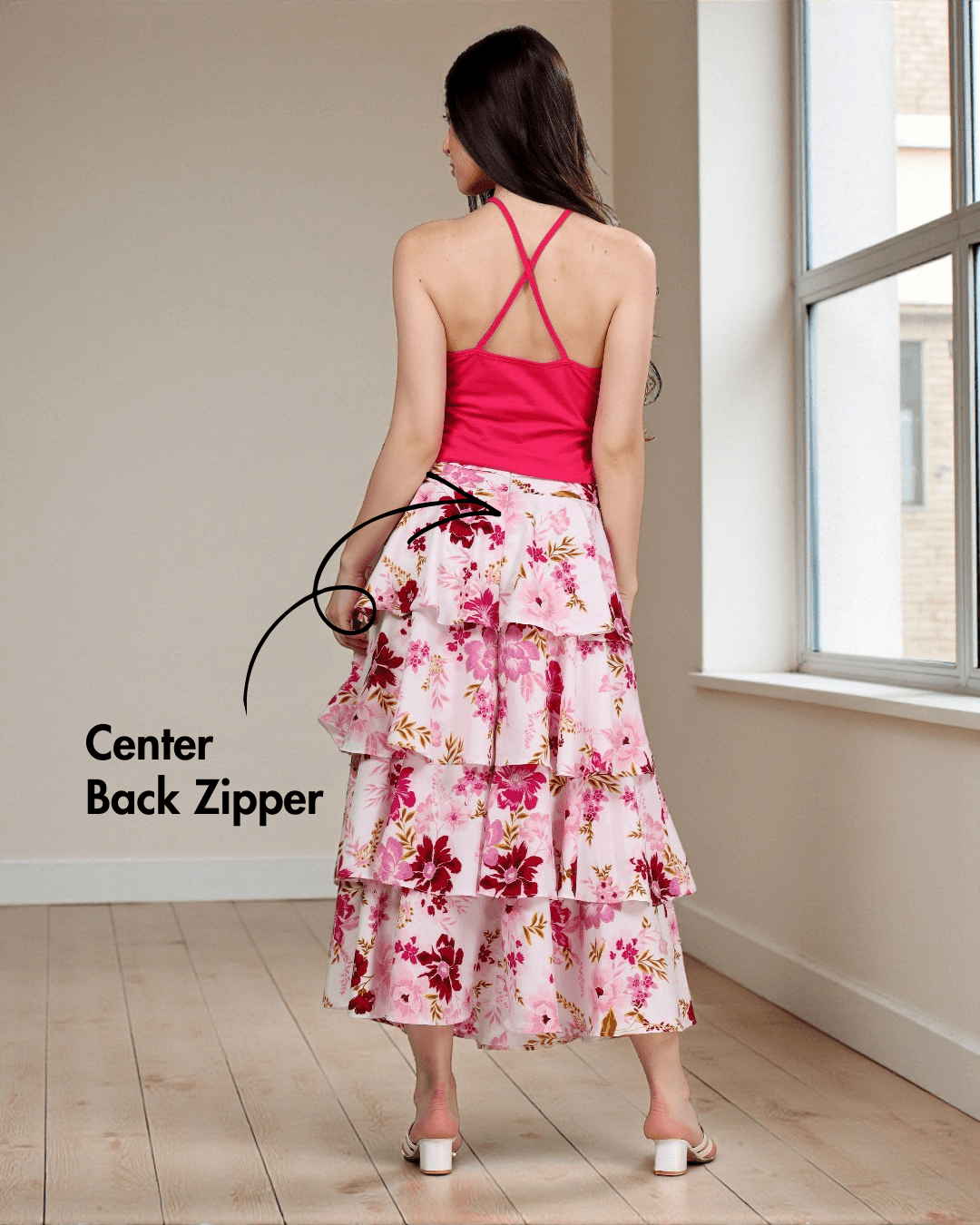 Back view of Ruffled Tiered Skirt Sewing Pattern 'Amy' showcasing center back zipper and tiered floral design for a secure and stylish fit.