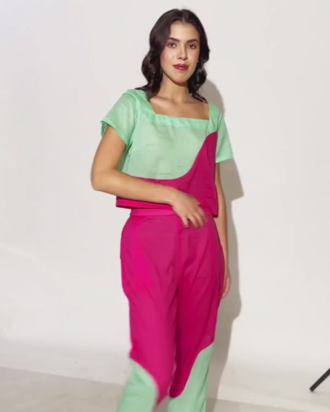 Model wearing colorful coordinated top and pants set made from sewing pattern 'Mary'