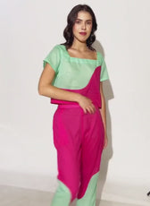 Model wearing colorful coordinated top and pants set made from sewing pattern 'Mary'
