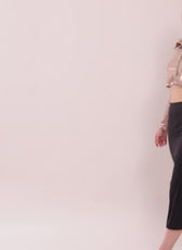 video of a model posing in a crop shirt with a straight hem and full-length sleeves sewed with winslet's patterns