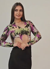 Video of Model wearing pointed hem crop top with long sleeves and collar