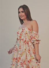 Video of model wearing an off shoulder dress sewed with winslet's pattern